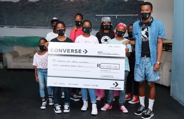 Converse hands over donation to Surfers Not Street Children