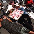 Aids activists lie down in protest in front of parliament in 2001 in Cape Town, South Africa.
