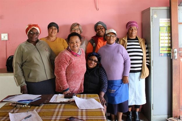 The team running the soup kitchens. Front row: Nomama Hendrick aka Mienkie, Wendy Wynand (JE Foundation director), Elsie Capuka and Veronica Williams. Back row: Cemelia Malan aka Mila, Hettie Orffer from the Youth4Life/Beat the Bully Team, Joyce Flaunder and Rachel Davids