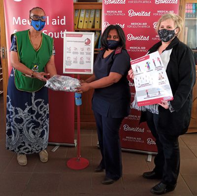 From left to right: MP Ms Simphiwe Mbatha handing over much needed supplies to Mrs L. Delport and Mrs A. Fourie of the TransOranje School of the Deaf.
