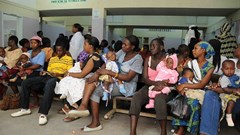 People wait for care at a Kenyan clinic. Photo by Wendy Stone/Corbis via Getty Images