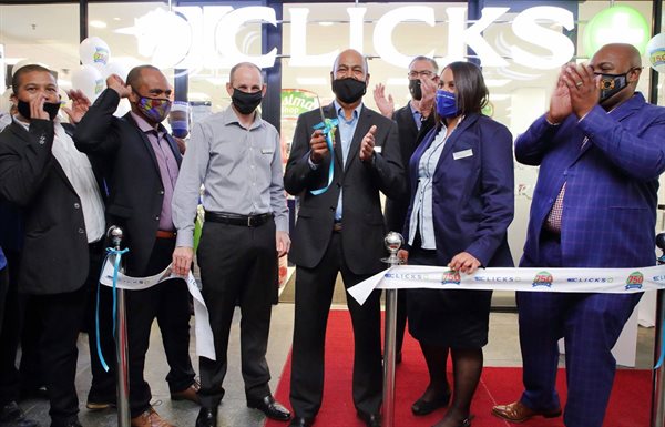 Vikesh Ramsunder, Clicks Group CEO and staff at the opening of Clicks 750th store at Cape Quarter in Cape Town.