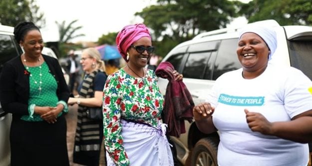 Winnie Byanyima (centre), UNAids executive director