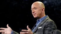 Jeff Bezos reshaped retail as CEO of Amazon. AP Photo/John Locher