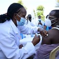 A healthcare worker administers an Oxford/AstraZeneca Covid-19 vaccine to her colleague at Mutuini Hospital in Nairobi. Kenya on March 3, 2021. Photo by Dennis Sigwe/SOPA Images/LightRocket via Getty Images