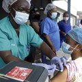 Hospital staff in Lagos, Nigeria, administer the AstraZeneca vaccine. AP Photo/Sunday Alamba