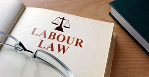 Can the Labour Court determine review proceedings of a liquidated company?