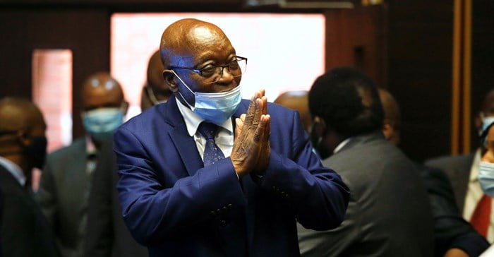 South Africa's former President Jacob Zuma, who is facing fraud and corruption charges, greets supporters in the gallery of the High Court in Pietermaritzburg, South Africa, May 17, 2021. Reuters/Rogan Ward