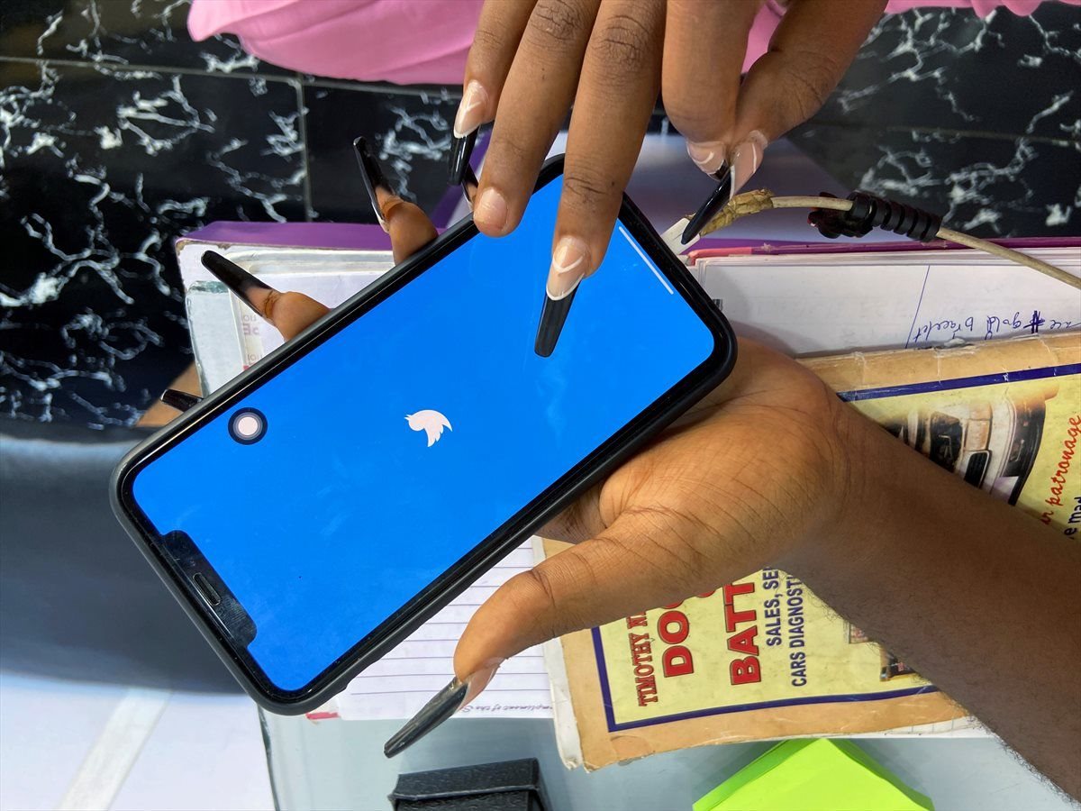Lagos-based entrepreneur Ogechi Egemonu opens the Twitter app on a smartphone at her office in Lagos, Nigeria 10 June 2021. Reuters/Seun Sanni