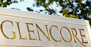 The logo of commodities trader Glencore is pictured in front of the company's headquarters in Baar, Switzerland, July 18, 2017. Reuters/Arnd Wiegmann