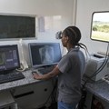Healthcare worker, Boitsholo Mfolo, inside the digital x-ray truck at one of Africa Health Research Institute’s mobile screening camps in rural KwaZulu Natal, South Africa. Samora Chapman/ Africa Health Research Institute