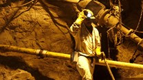 A mine worker is seen underground in South Deep mine outside Johannesburg, file. Reuters/Siphiwe Sibeko