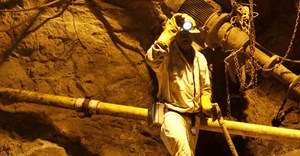 A mine worker is seen underground in South Deep mine outside Johannesburg, file. Reuters/Siphiwe Sibeko