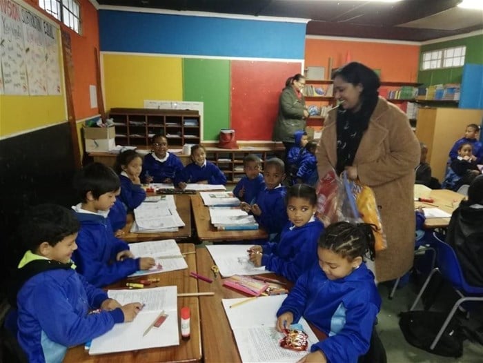 Biz Press Office assistant Maroefah Smith, Mandela Day 2019:  volunteering at Western Cape Education Department's literacy programme at Manenberg Primary School in Cape Town.