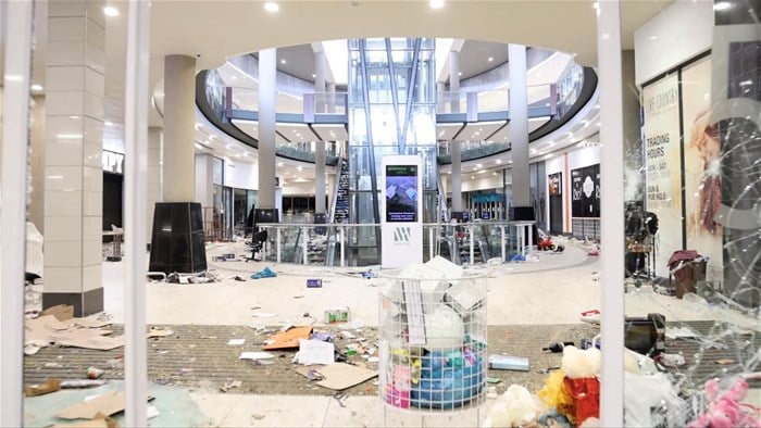 A view shows damage inside a shopping mall following protests that have widened into looting, in Durban, South Africa 13 July 2021, in this screen grab taken from a video. Courtesy Kierran Allen/via Reuters
