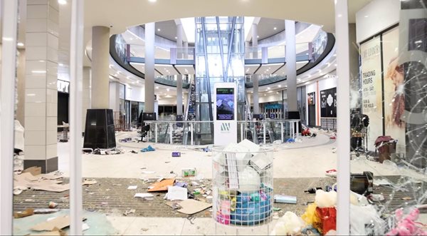 A screen grab taken from a video shows the damage inside a shopping mall following protests. Source: Courtesy Kierran Allen/via Reuters
