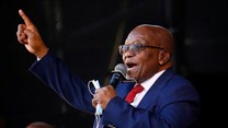 Former South African President Jacob Zuma, who is facing fraud and corruption charges, sings after his appearance in the High Court in Pietermaritzburg, South Africa, May 26, 2021. Reuters/Rogan Ward/File Photo