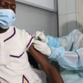 A health worker receives a vaccine against Ebola at a hospital after a case of Ebola was confirmed in Abidjan, Ivory Coast 16 August 2021. Reuters/Luc Gnago