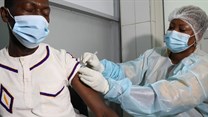A health worker receives a vaccine against Ebola at a hospital after a case of Ebola was confirmed in Abidjan, Ivory Coast 16 August 2021. Reuters/Luc Gnago