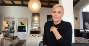 Charlize Theron talking during the PSG Think Big Series