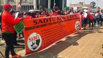 Members of the South African Democratic Teachers Union picket outside to the provincial legislature in Pietermaritzburg on Tuesday. They are demanding that the education department pay them and fill vacant teacher posts. Photo: Nompendulo Ngubane / GroundUp