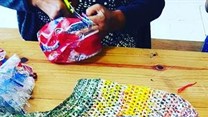 Turning bread plastic bags into reusable shopping bags