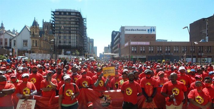 Vuyisile Mini Square in Gqeberha was a sea of red as Numsa members gathered to mark the start of the strike by steel engineering workers on Tuesday. Photo: Joseph Chirume