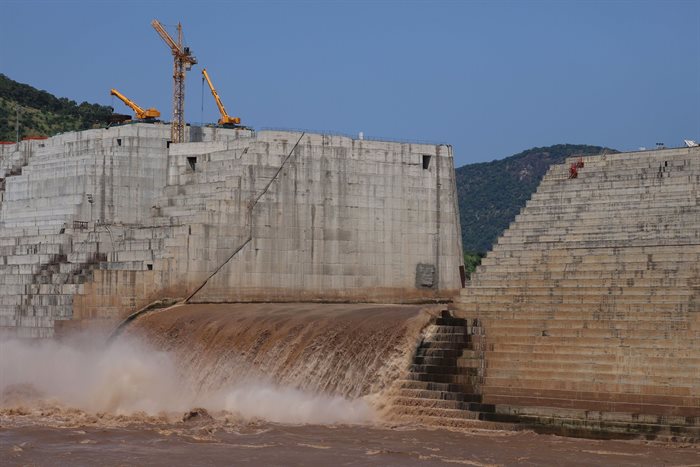 Water flows through Ethiopia's Grand Renaissance Dam as it undergoes construction work on the river Nile in Guba Woreda, Benishangul Gumuz Region, Ethiopia. Picture taken 26 September 2019. Reuters/Tiksa Negeri