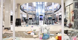 A view shows damage inside a shopping mall following protests that have widened into looting, in Durban, South Africa 13 July 2021, in this screen grab taken from a video. Courtesy Kierran Allen/via Reuters