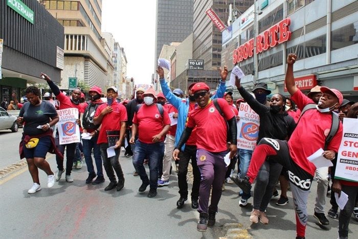 Clover workers, who have been on strike for nearly nine weeks, marched through Johannesburg city centre on Tuesday, calling for a boycott of the company’s products. Photo: Masego Mafata