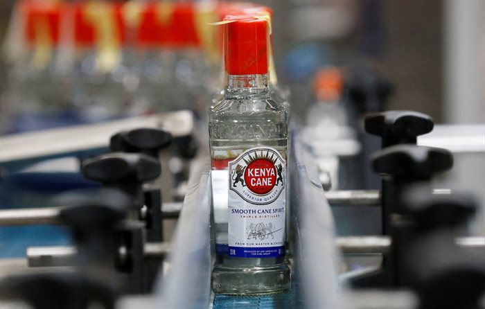 Kenya Cane spirit bottles are seen on a conveyor belt at the East African Breweries Limited factory in Ruaraka factory in Nairobi, Kenya. Source: Reuters/Thomas Mukoya