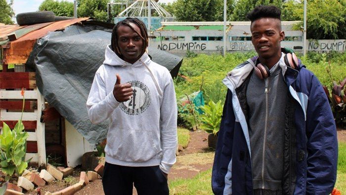 Makhosini Ndlovu and Thobelani Sodinga from Pimville Zone 9 in Soweto have transformed an illegal dump site into a thriving food garden for their community. | Source: Masego Mafata