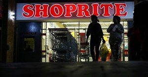 Shoprite weathers unrest to pump up first-half profit