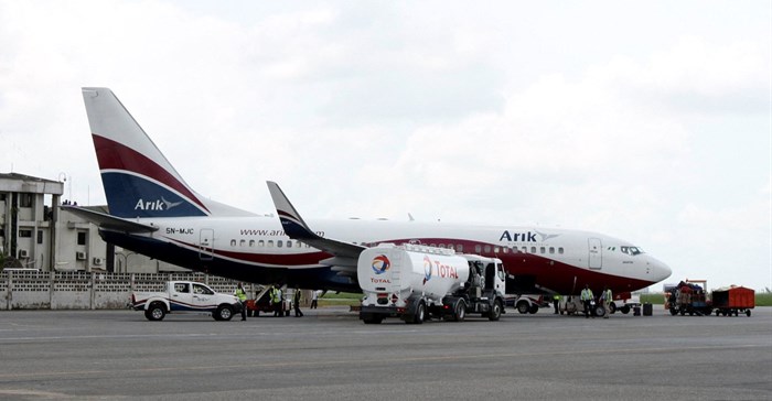 A Boeing 737-7BD Arik Air aeroplane is seen parked on the tarmac at the local airport in Lagos, file. REUTERS/Akintunde Akinleye/File Photo
