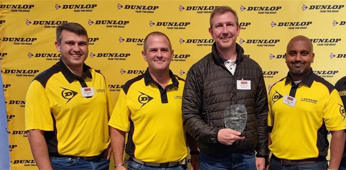 Dunlop Commercial Dealer of the Year<br>Wynand Meij (middle with trophy), Group CFO of Tire Point in Kempton Park, accepted the award for Dunlop Commercial Dealer of the Year 2021. He is flanked from left to right by Sumitomo Rubber SA’s Louis Marais (divisional head: Sales Commercial), Lubin Ozoux (CEO) and Darren Chetty (Group director: Sales, Marketing, Operations & Technical).