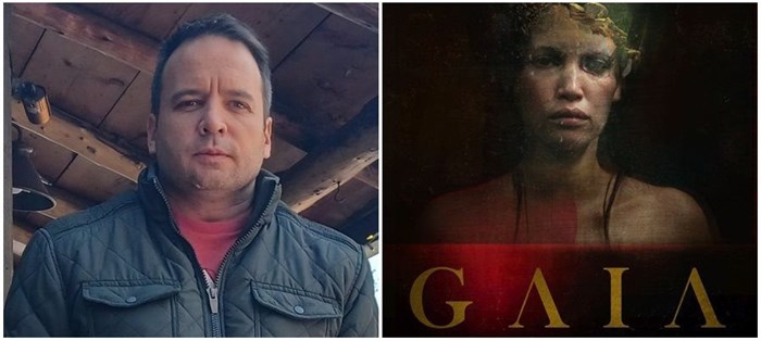 Image supplied: Tertius Kapp alongside the poster of his film Gaia
