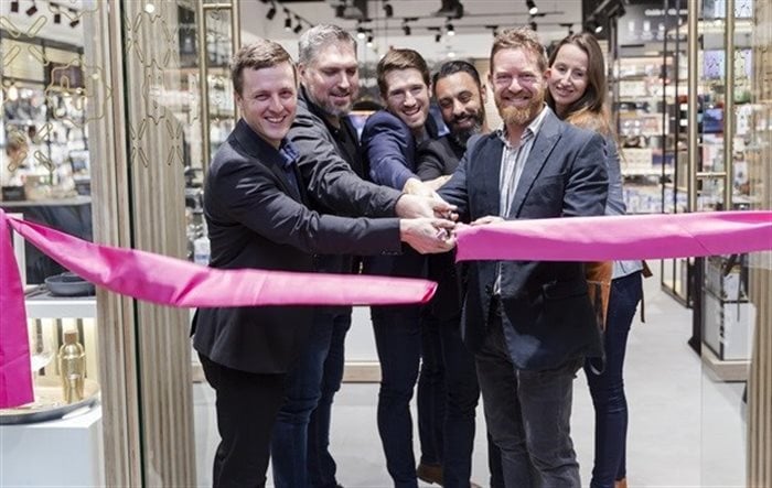 From left: Yuppiechef founders Andrew Smith and Shane Dryden with staff at a store opening. Source: Yuppiechef