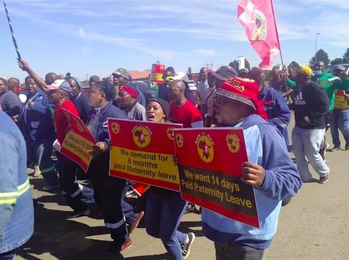 Striking ArcelorMittal workers marched to the company headquarters on Tuesday, 24 May, with a memorandum of demands. Photo: Chris Gilili
