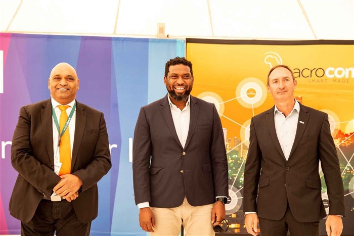 Sivi Moodley (left), Macrocomm Group CEO, and Buti Manamela (middle) | image supplied
