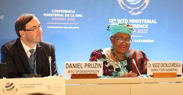 Source: Supplied. World Trade Organization Director-General Ngozi Okonjo-Iweala (centre) at the recent WTO Ministerial meeting - at the MC12 Closing Press Conference, 17 June 2022.