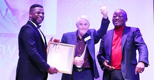Supplied. Anthony Heard (centre), gives the thumbs up on receiving his Lifetime Achiever Award from (left) Sanef chairperson, Sbu Ngalwa and (right) Standard Bank CEO, Lungisa Fuzile