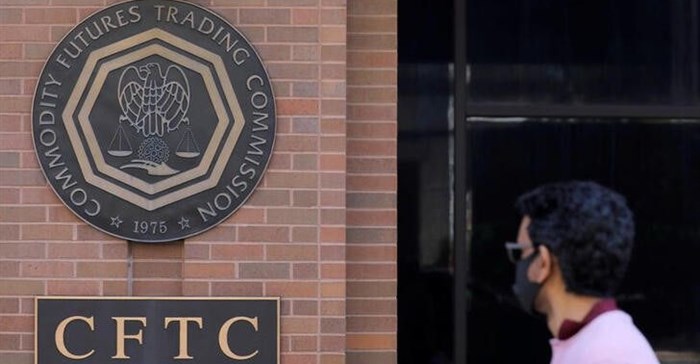 Signage is seen outside of the US Commodity Futures Trading Commission (CFTC) in Washington, DC, US, 30 August 2020. Reuters/Andrew Kelly