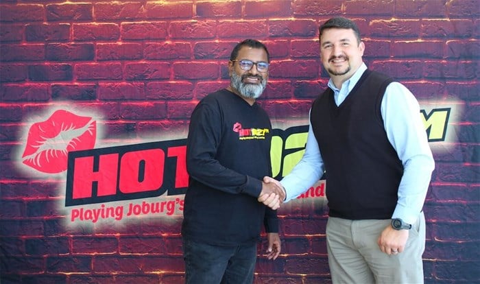 Lloyd Madurai, managing director of Hot 102.7FM and Andre Grobler, divisional service manager at CFAO Motors South Africa – Volkswagen & Audi