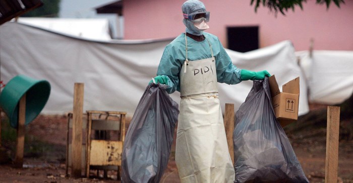 Source: Reuters. A health worker in protective clothing carries waste for disposal outside the isolation ward where victims of the deadly Marburg virus are treated in the northern Angolan town of Uige, File.