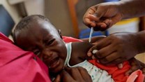 Source: Reuters. A nurse administers the malaria vaccine to an infant at the Lumumba sub-county hospital in Kisumu, Kenya.