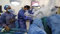 Source: Reuters. South African surgeons Dr Tim Forgan and Dr Imraan Mia use a robot called DaVinci to perform delicate operations at the Tygerberg hospital in Cape Town.