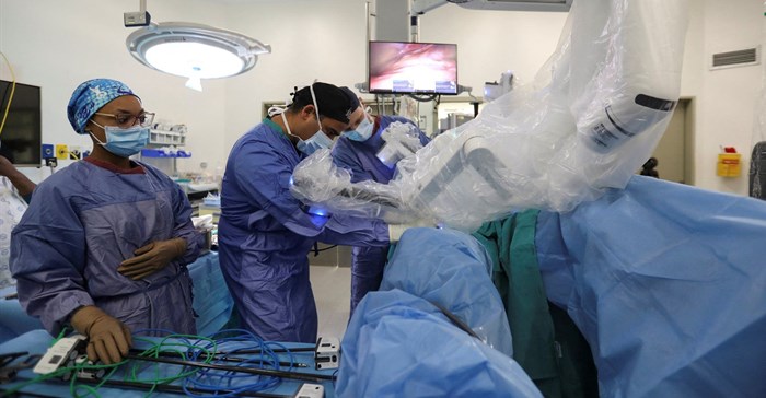 Source: Reuters. South African surgeons Dr Tim Forgan and Dr Imraan Mia use a robot called DaVinci to perform delicate operations at the Tygerberg hospital in Cape Town.