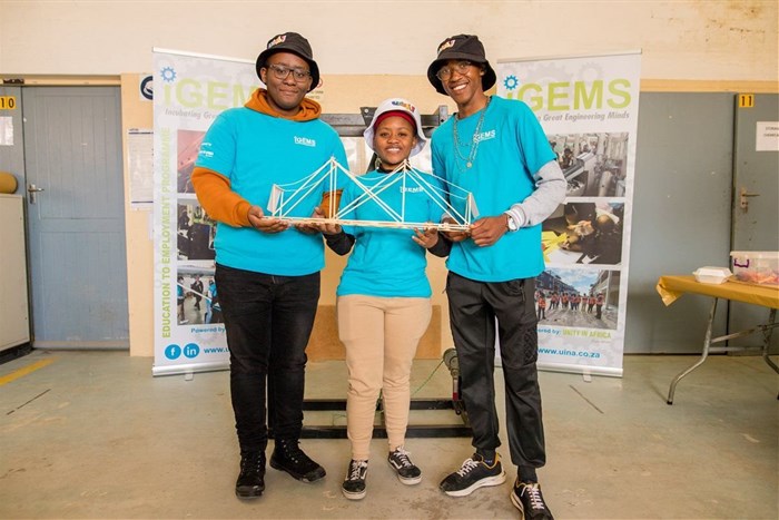 Source: Supplied | The winning team, from left, Lunar Dakada, a grade 11 learner at Lawson Brown High School, Asemahle Beyi, a grade 11 learner at Sanctor High School and Lonwabo Xalanga, a grade 12 learner at Marymount High School – who all form part of the iGEMS education-to-employment programme – were crowned the winners of the annual iGEMs bridge-building competition hosted at the SANRAL Lab in Struandale, Gqeberha.