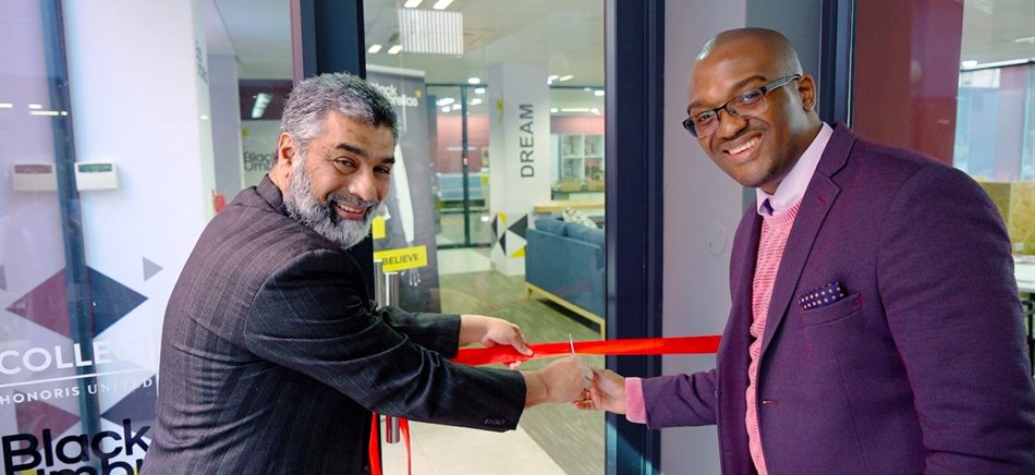 Hoosen Essof, manager of redHUB at Regent Business School, and Xolile Ndumndum, Black Umbrellas chief operating officer at the official opening of the Black Umbrellas incubation lounge at the Regent Business School Durban campus