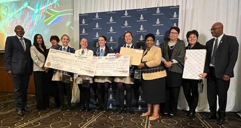 2022 MPC Schools Challenge: Minister of Basic Education Angie Motshekga and governor of the SA Reserve Bank Lesetja Kganyago with Marais Viljoen High School learners and their teacher, Anita Last. Picture: Supplied